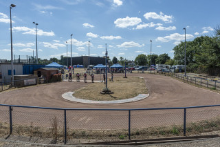 Men's Cycle Speedway Battle of Britain & Elite GP Round 3, Ipswich - riders on the starting line, wide shot of track.