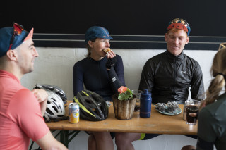 Four riders stopped at a cafe